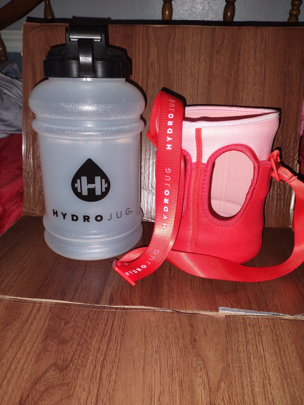 HydroJug Red Neoprene Bottle Carrier with Pink Lining